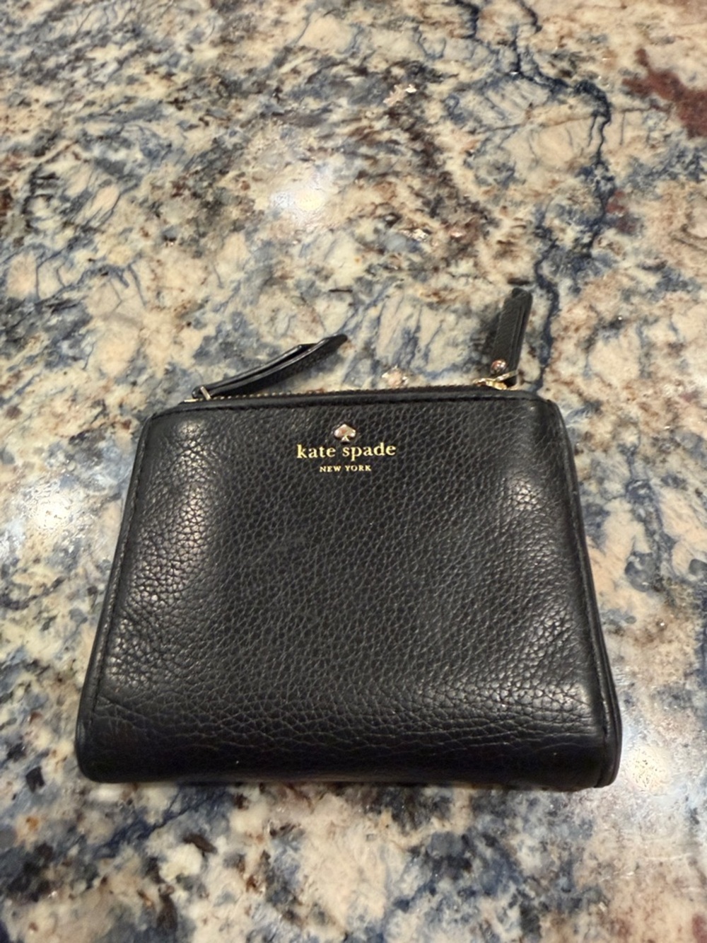 kate spade black pebbled leather zip-around wallet with gold logo